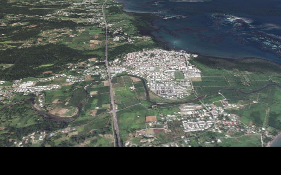 Vue 3D du bourg de Goyave dans le jumeau numérique : bâti, voirie et emprise urbaine.